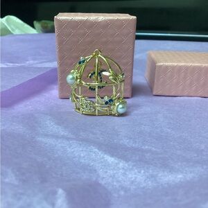 Chanel birdcage pendant.